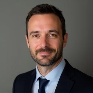 Professional headshot of Jean-Pierre Dubois, Media Ethics Specialist.
